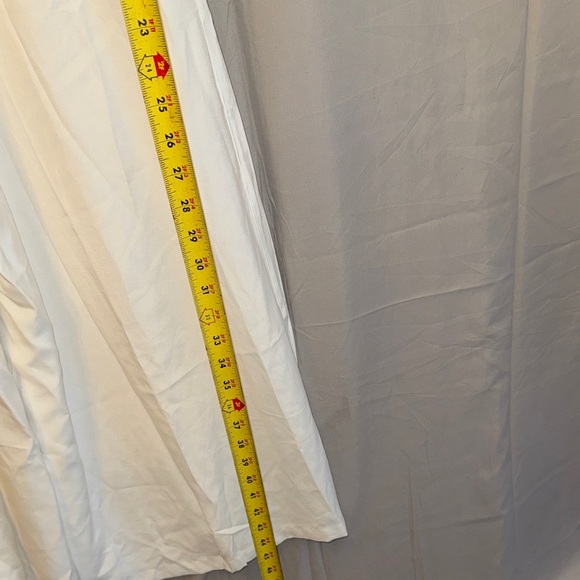 Elegant White Sleeveless Jumpsuit - Picture 11 of 13